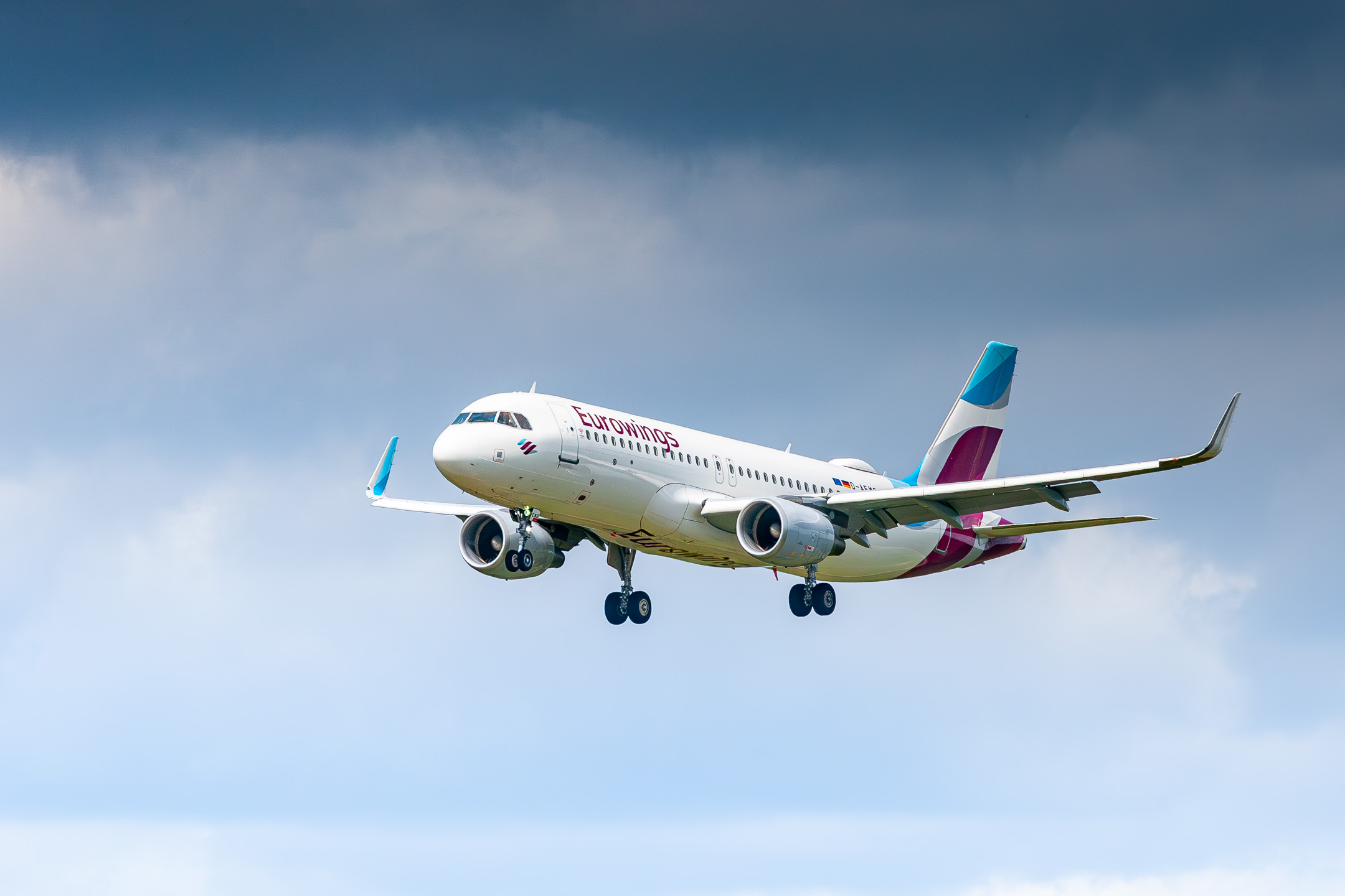 Eurowings Airbus A320-200 "D-AEWG" on short final for runway 23L at Düsseldorf Airport, May 2021