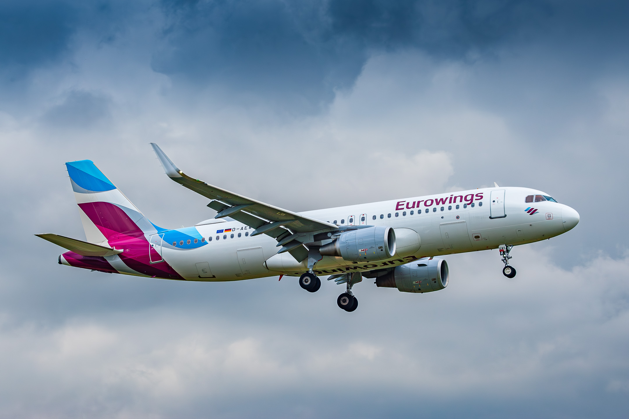 Eurowings Airbus A320-200 "D-AEWO" on short final for runway 23L at Düsseldorf Airport, July 2021