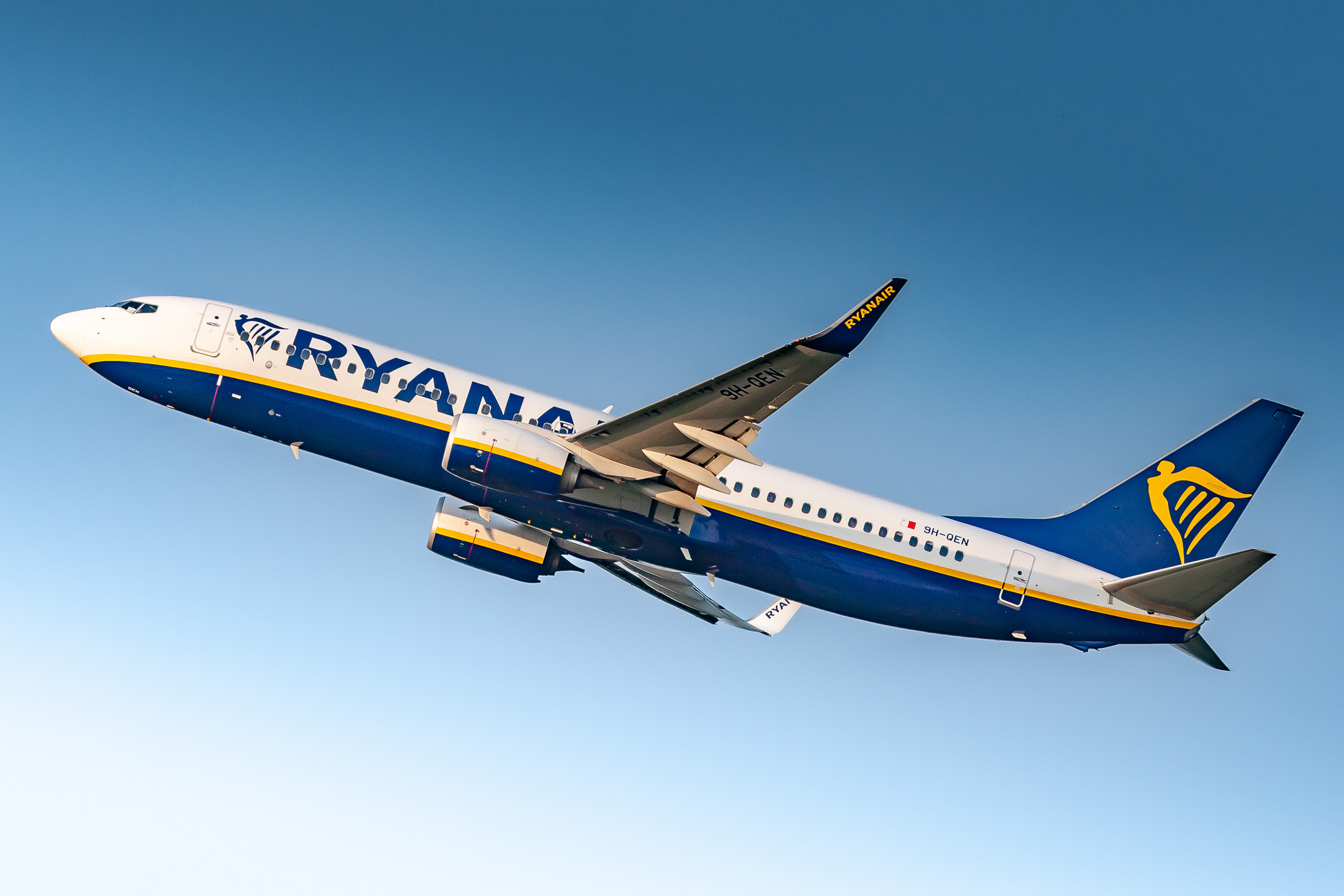 Ryanair Boeing 737-800 "9H-QEN" taking off from runway 32 right at Köln Bonn Airport on a warm summer evening, July 2021.