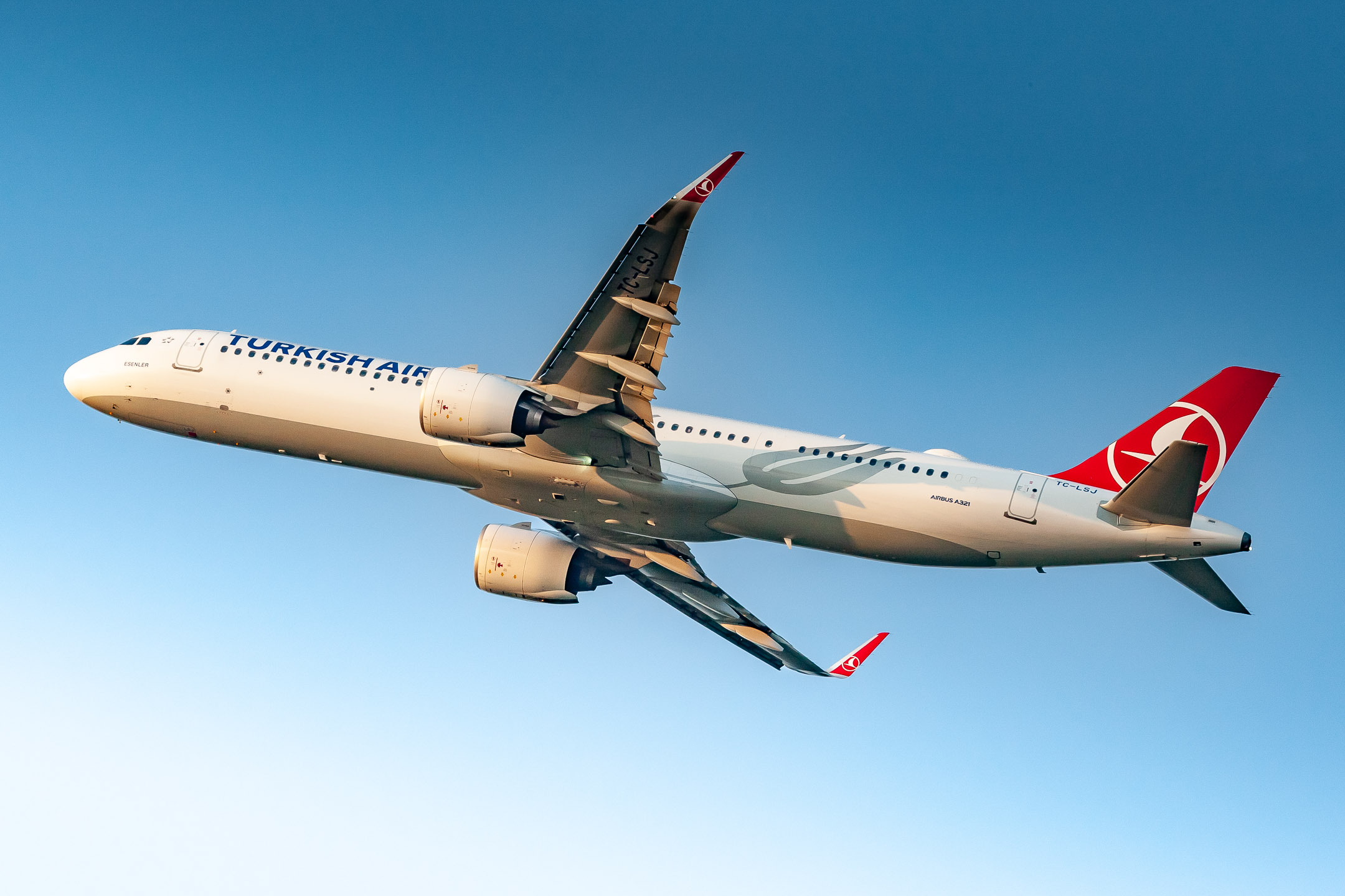 Turkish Airlines Airbus A321neo taking off from runway 32R at Köln Bonn Airport on a warm and sunny summer afternoon on July 21nd, 2021