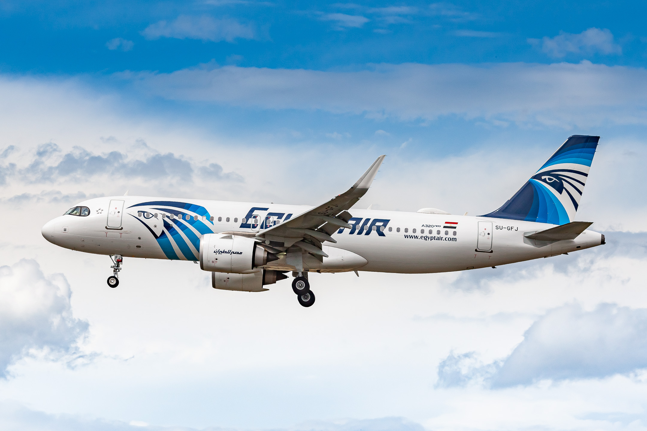 Egyptair Airbus A320neo "SU-GFJ" coming in on runway 25 center at Frankfurt Airport on a cloudy summer afternoon, August 2021.