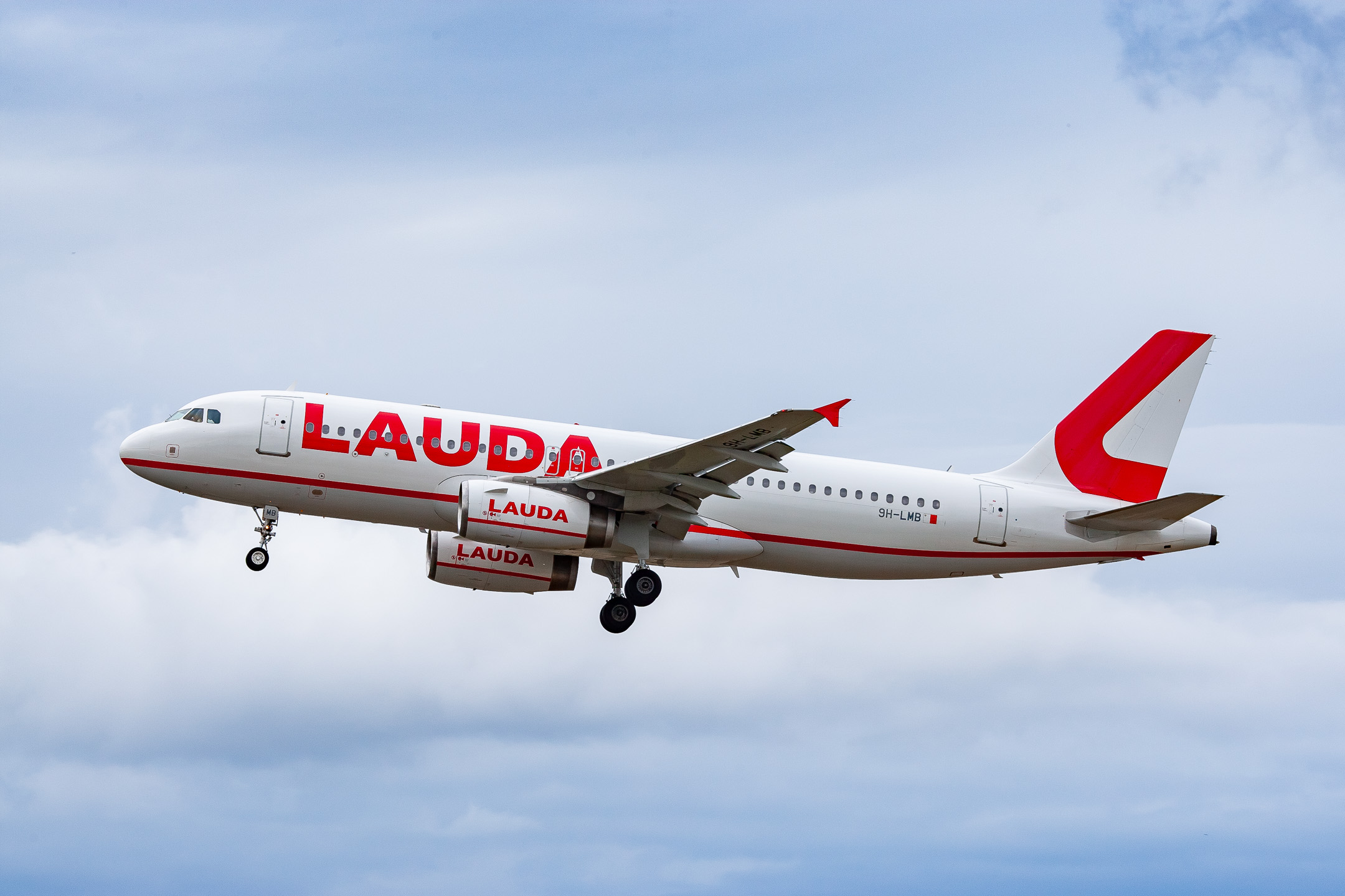 Lauda Air Airbus A320-200 "9H-LMB" on short final for runway 25C at Frankfurt Airport, August 2021.