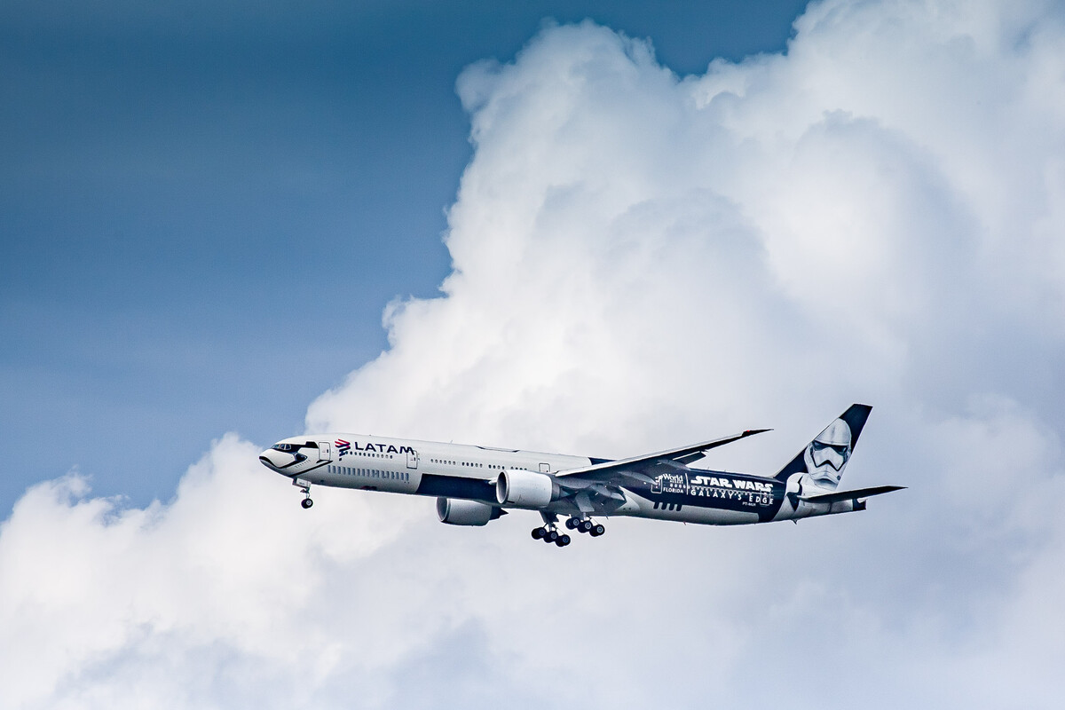 LATAM Airlines Brasil Boeing 777-300ER "PT-MUA" with the Star Wars Galaxys Edge livery on short final for runway 25 right at Frankfurt airport on a nice but cloudy summer afternoon, August 2021