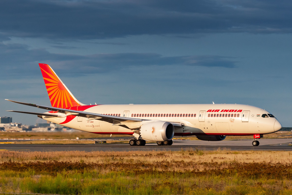 Air India Boeing 787-8 Dreamliner "VT-ANX" accelerating on runway 18 at Frankfurt Airport on a hot summer evening, August 2021.