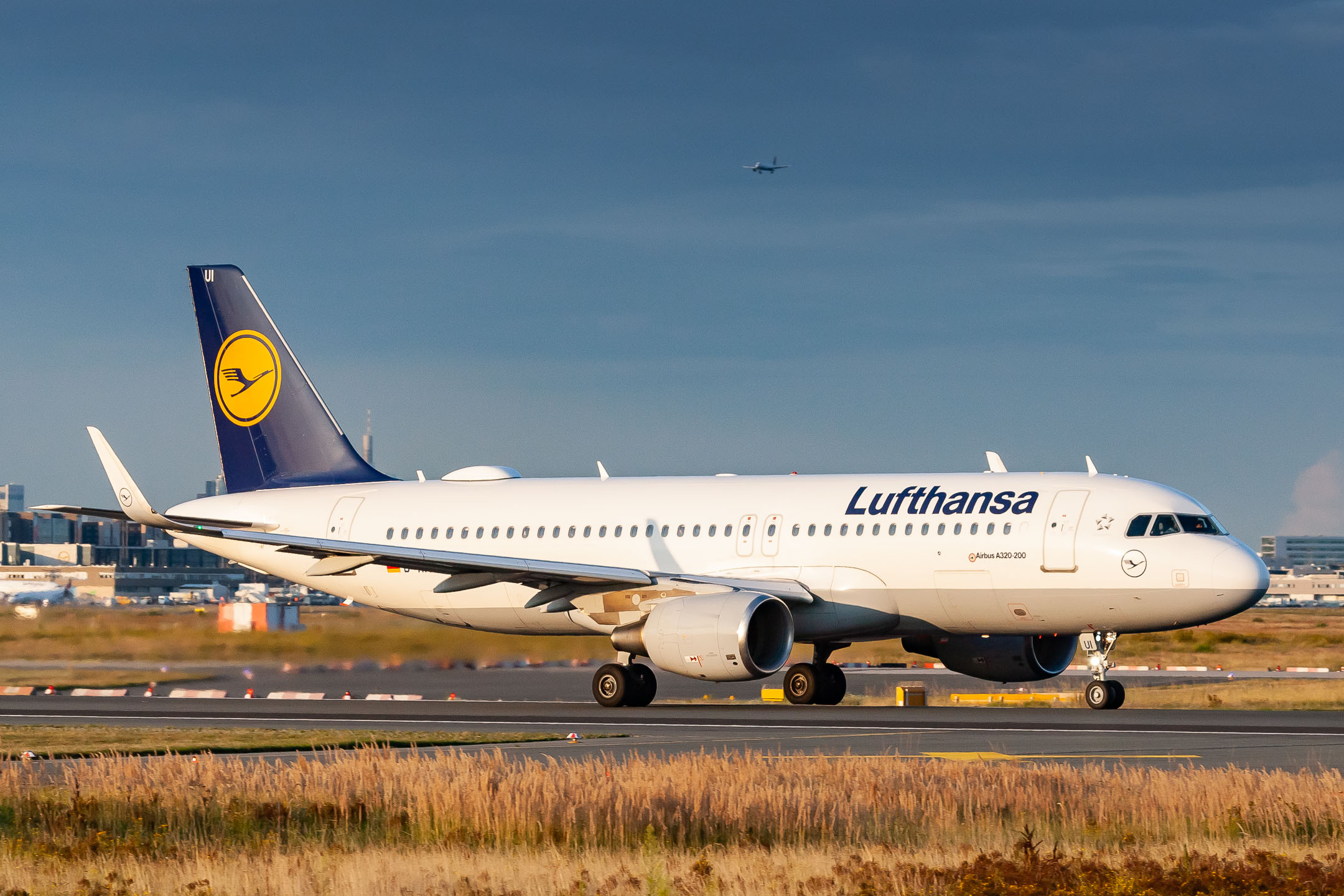 Lufthansa Airbus A320-200 "D-AIUI" departing from runway 18 at Frankfurt Airport on a hot summer evening on August 9th, 2021