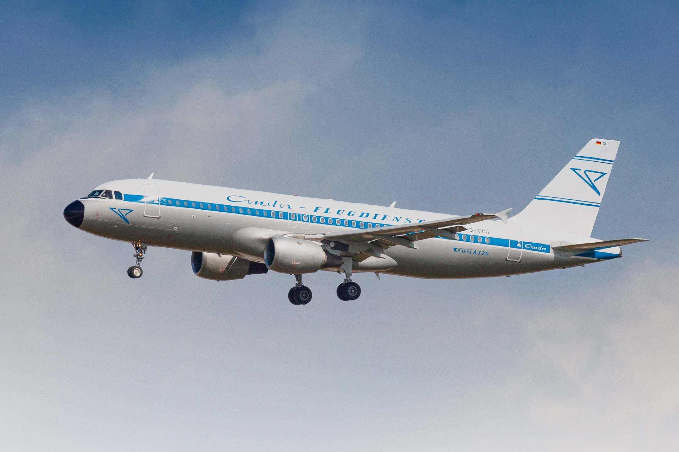 Condor Airbus A320-212 "D-AICH" with the retro livery coming in on short final for runway 25C at Frankfurt Airport, August 2012