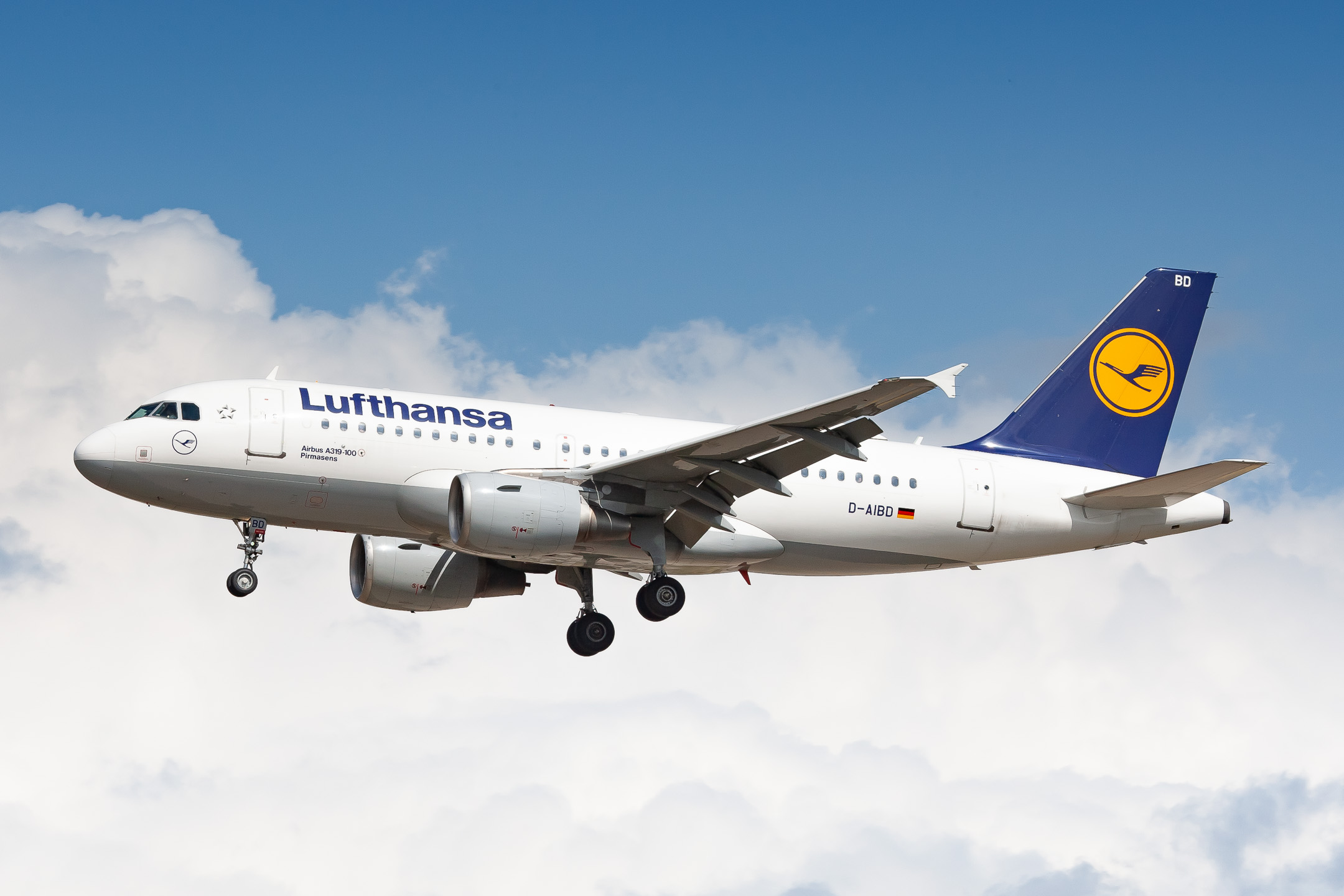 Lufthansa Airbus A319-100 "D-AIBD" which is named after the city of Pirmasens, coming in on runway 25C at Frankfurt Airport on a warm summer afternoon, August 2021.