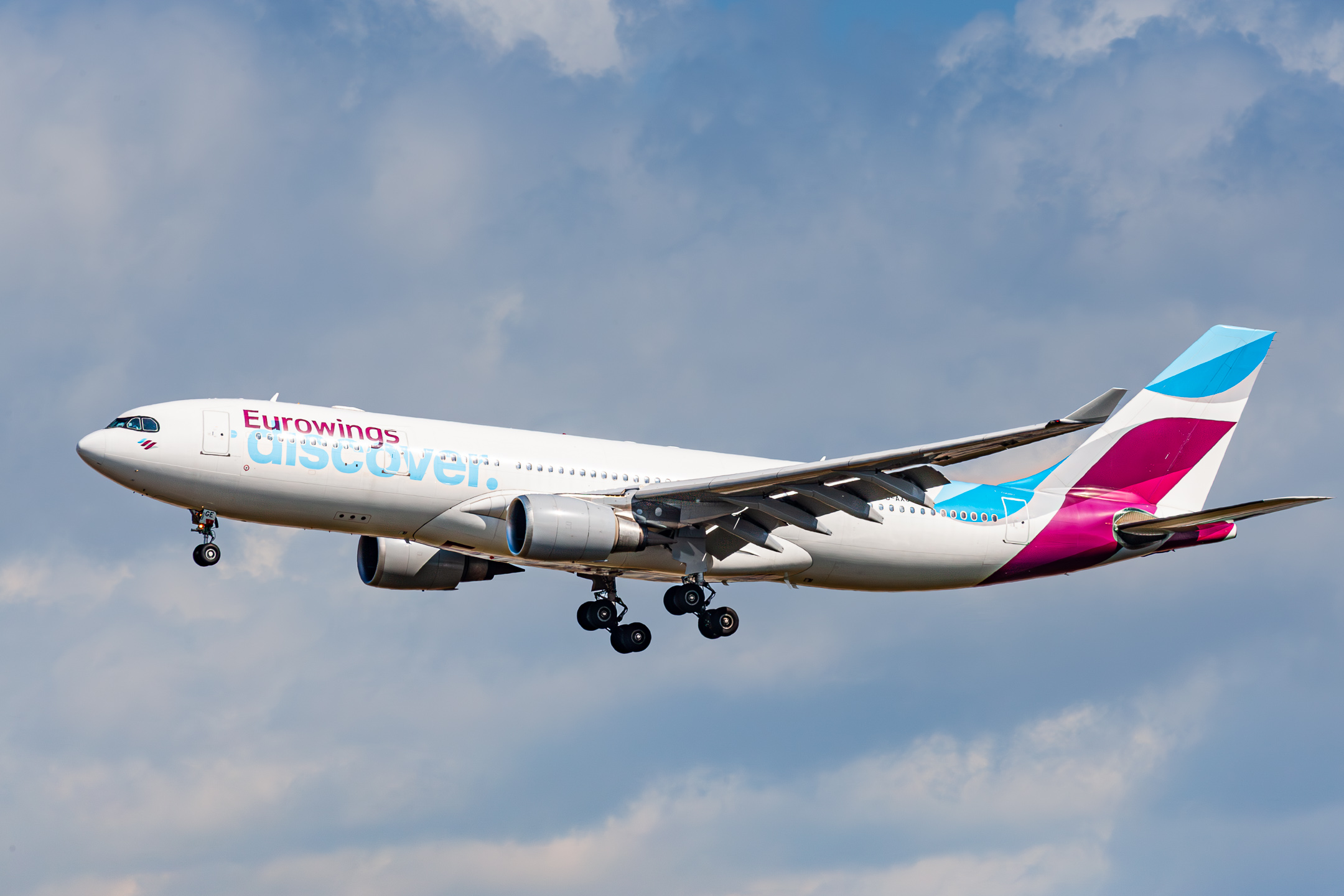 Eurowings Discover Airbus A330-203 "D-AXGE" coming in on short final for runway 25C at Frankfurt Airport, August 2021