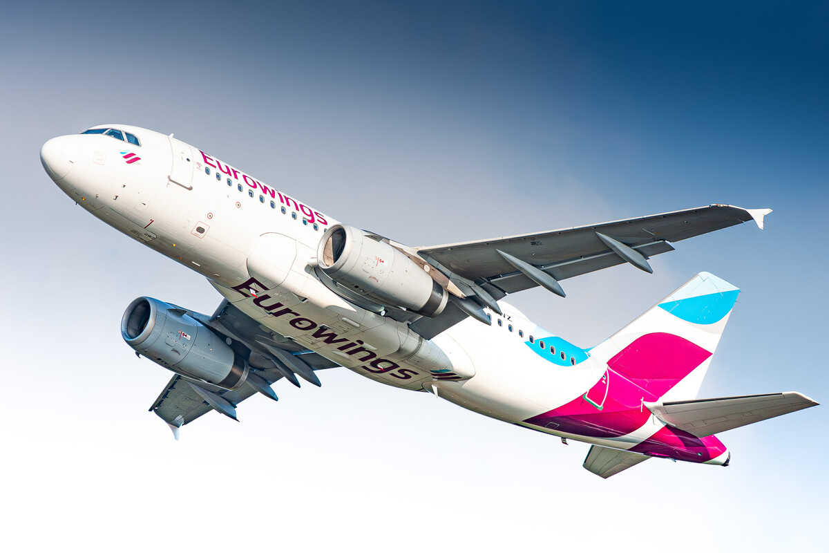 Eurowings Airbus A319-100 "D-AGWZ" taking off from runway 32 right at Köln Bonn Airport on a bright and sunny afternoon, September 2021