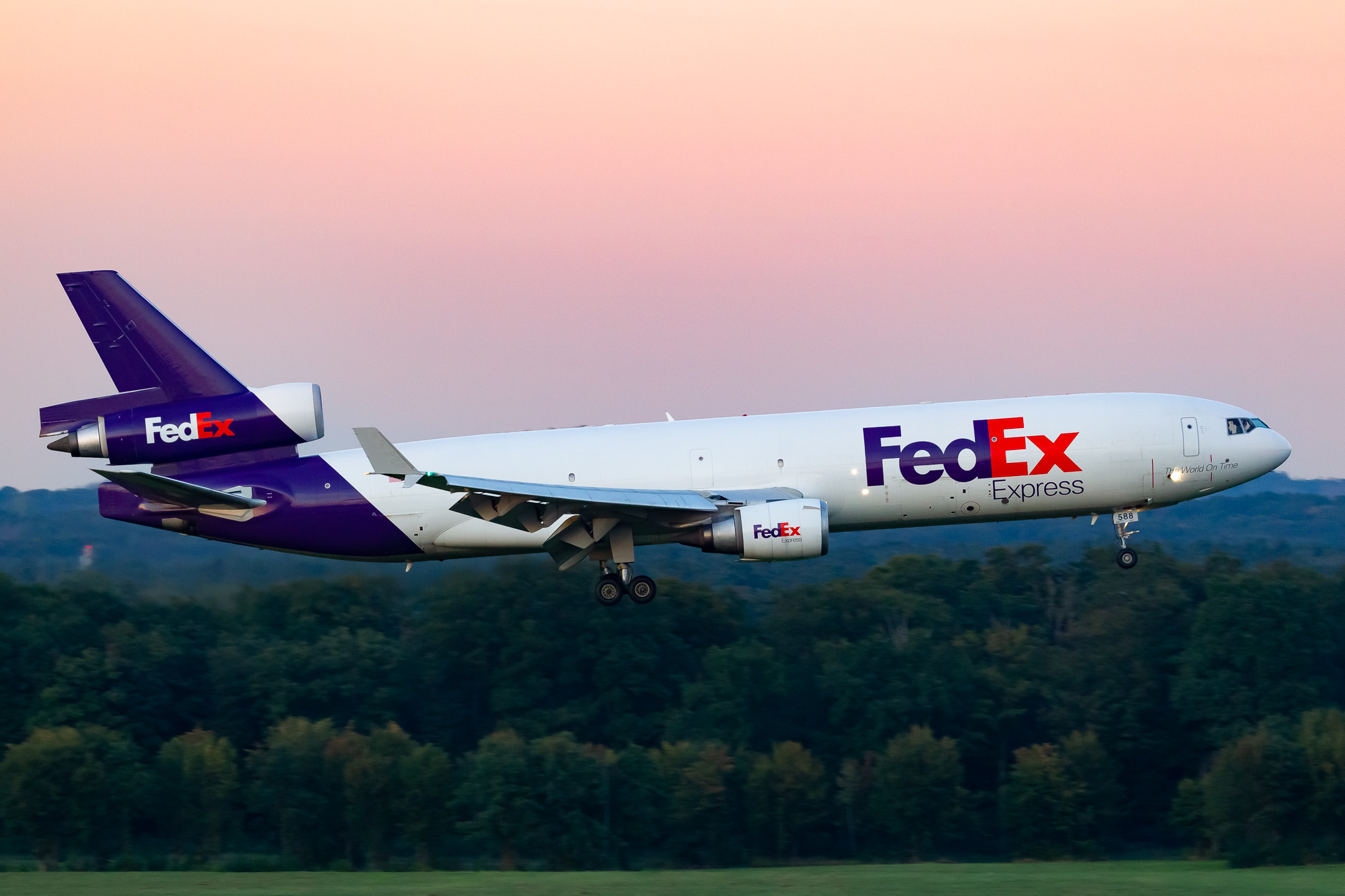 Fedex McDonnell Douglas MD11 "N588FE" arriving on a late summer evening at Cologne Bonn Airport runway 14L.