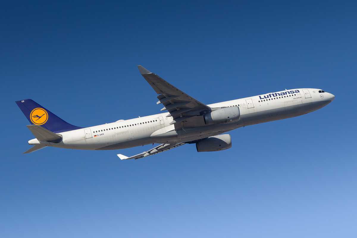 Lufthansa Airbus A330-300 "D-AIKN" taking off from runway 07 center at Frankfurt Airport on a very sunny autumn afternoon, October 2021