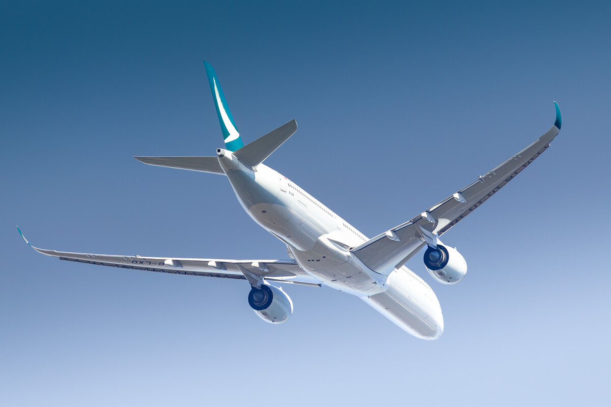 Cathay Pacific Airbus A350-1000 "B-LXO" taking off from runway 07 center at Frankfurt Airport on a sunny autumn afternoon, October 2021