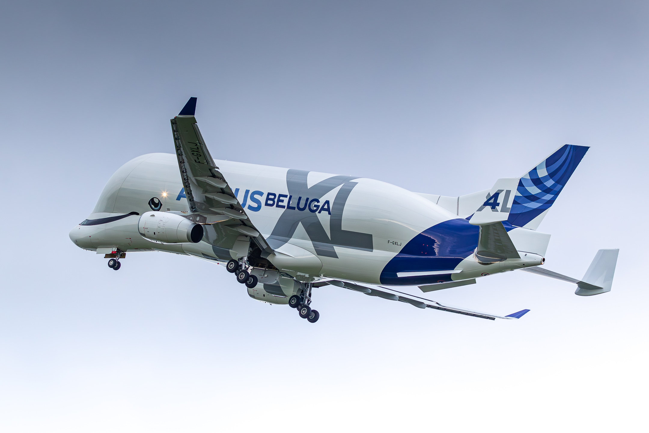 Airbus Works Airbus A330-700L Beluga XL "F-GXLJ" taking off from runway 23 at Hamburg Finkenwerder Airbus Airport on a cloudy and rainy autumn afternoon, October 2021