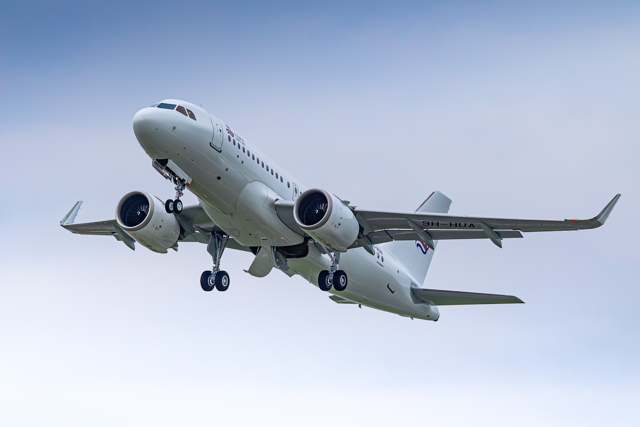 Sino Jet Airbus A319neo "9H-HUA" departing out of runway 23 at Hamburg Finkenwerder Airbus Airport, October 2021