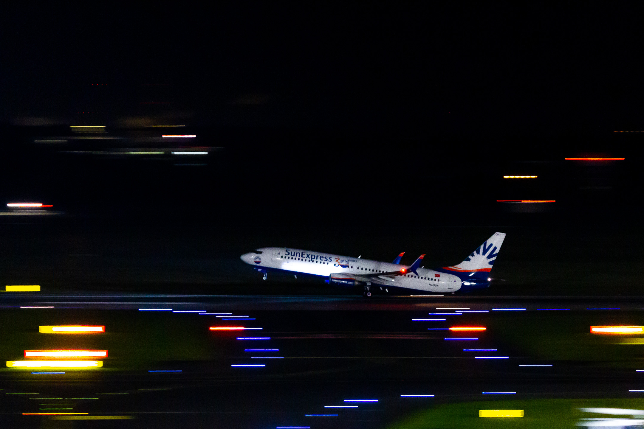 SunExpress Boeing 737-800 "TC-SOF" departing out of runway 23L at Düsseldorf airport.