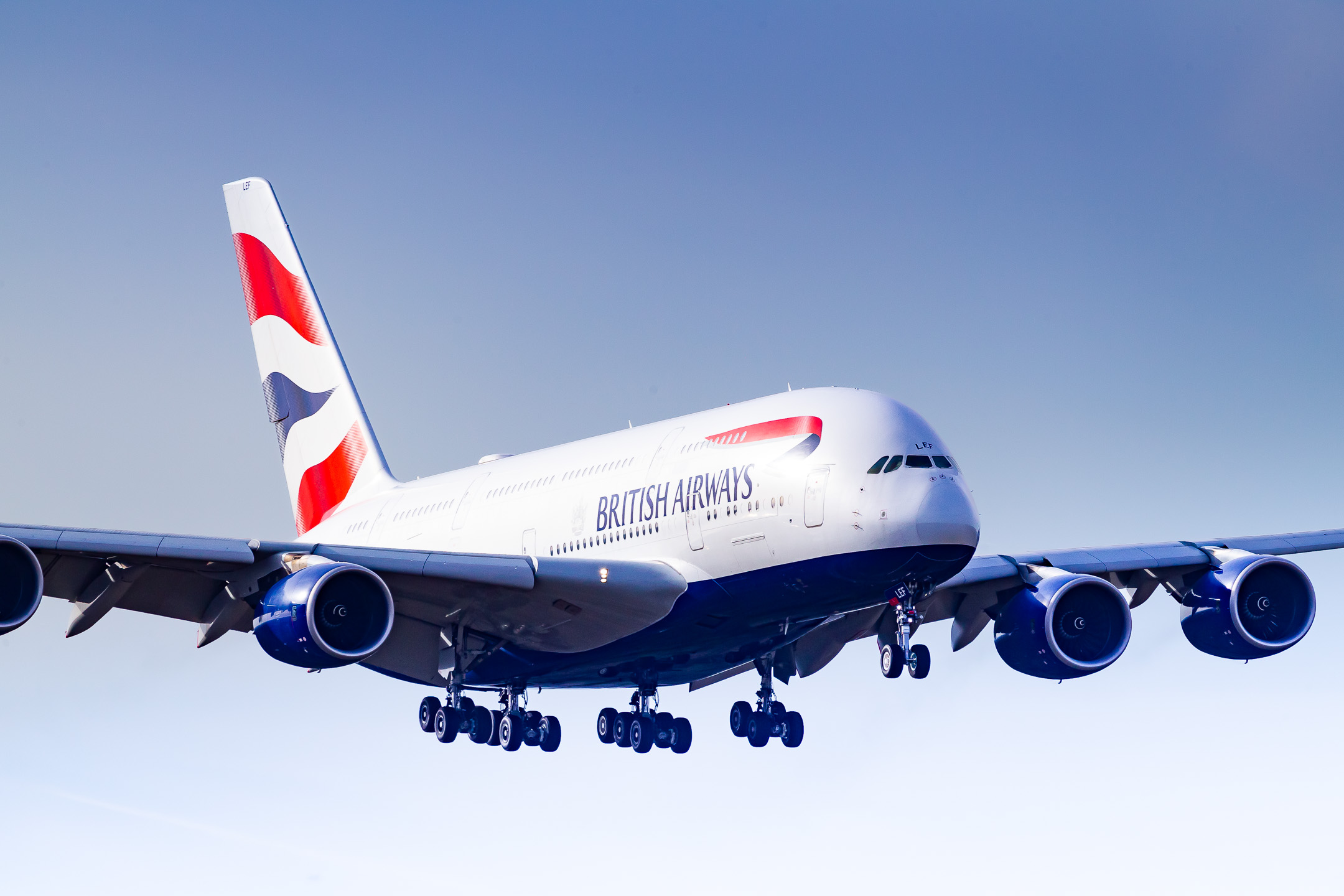 British Airways Airbus A380-800 "G-XLEF" on short final for runway 25R at Frankfurt Airport on a bright and sunny winter morning, February 2022