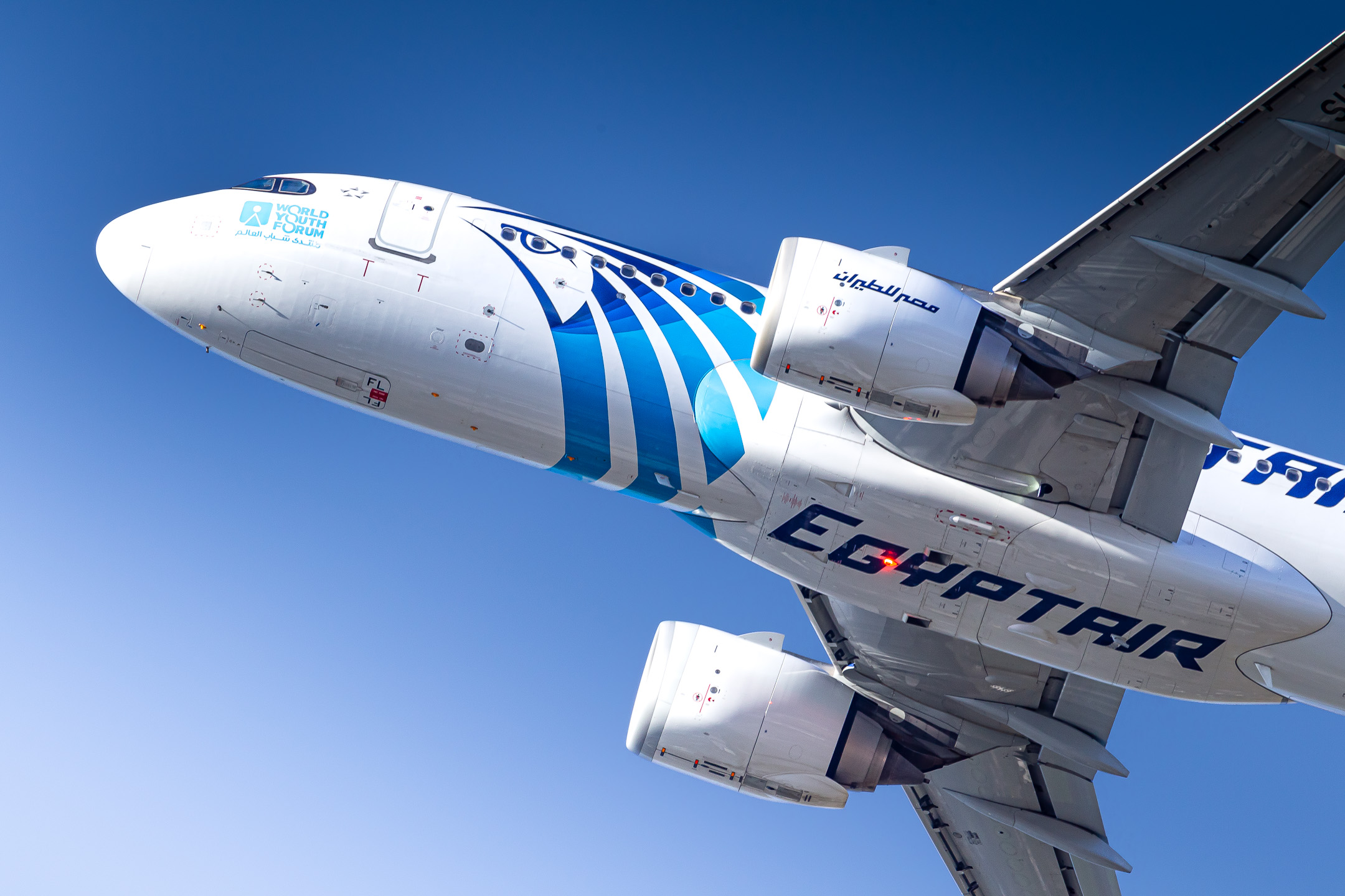 Egyptair Airbus A320neo "SU-GFL" taking off from runway 23L at Düsseldorf Airport on a sunny winter morning, February 2022