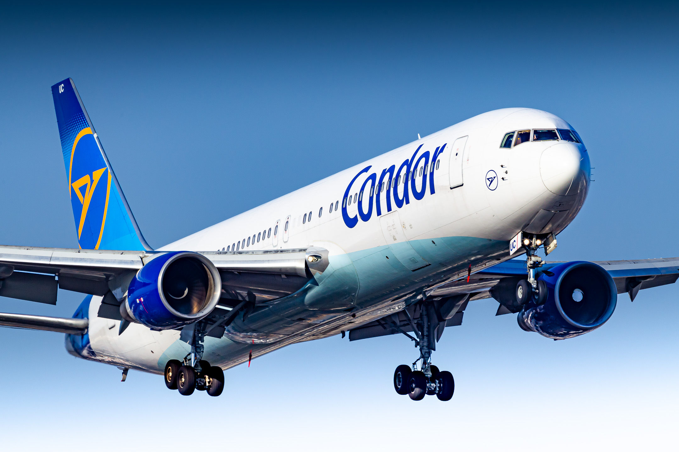 Condor Boeing 767-300 "D-ABUC" on short final for runway 25L at Frankfurt Airport on a bright and sunny winter morning, March 2022