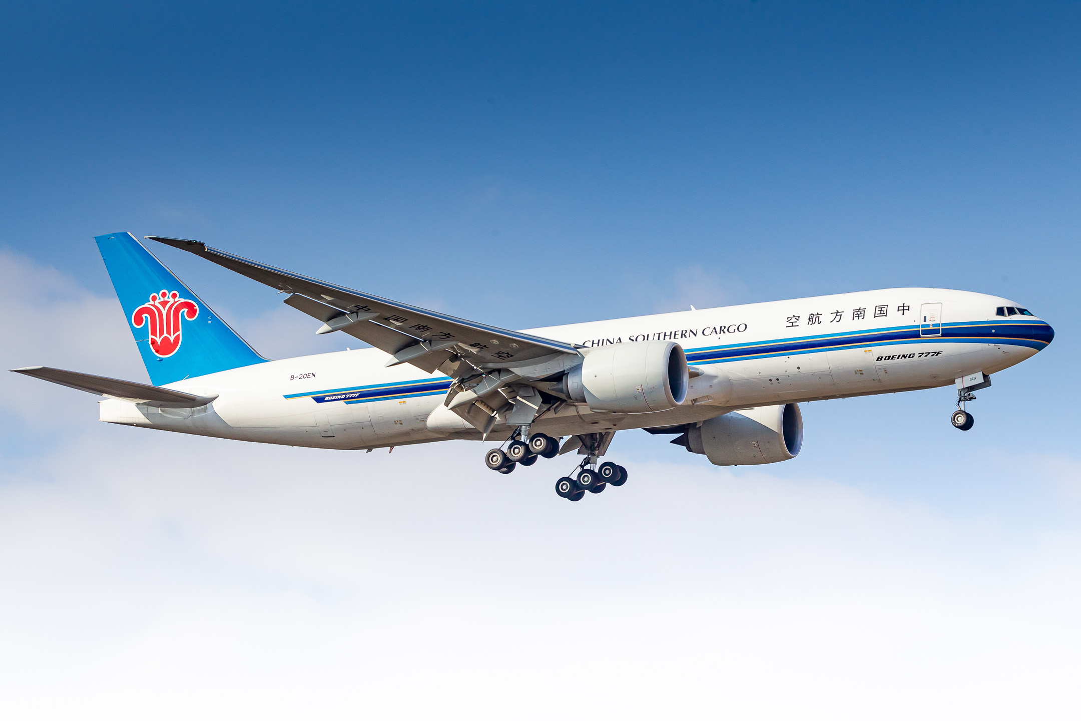 China Southern Cargo Boeing 777F "B-20EN" on short final for runway 07 center at Frankfurt Airport on a bright and sunny spring morning, March 2022