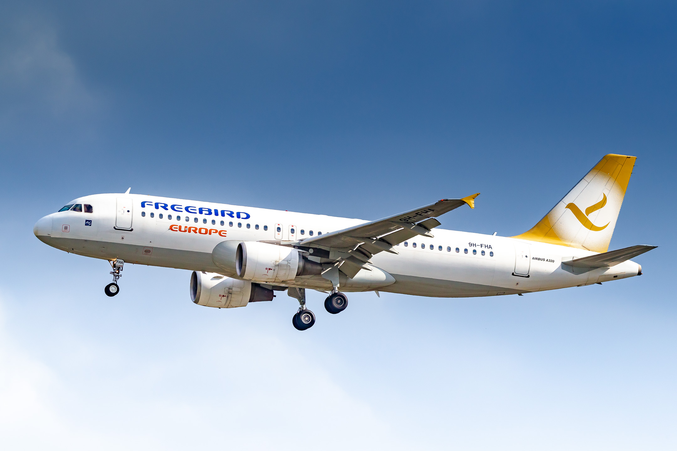 Freebird Airbus A320-200 "9H-FHA" on dort final for runway 05 right at Düsseldorf Airport on a warm spring afternoon, April 2022.