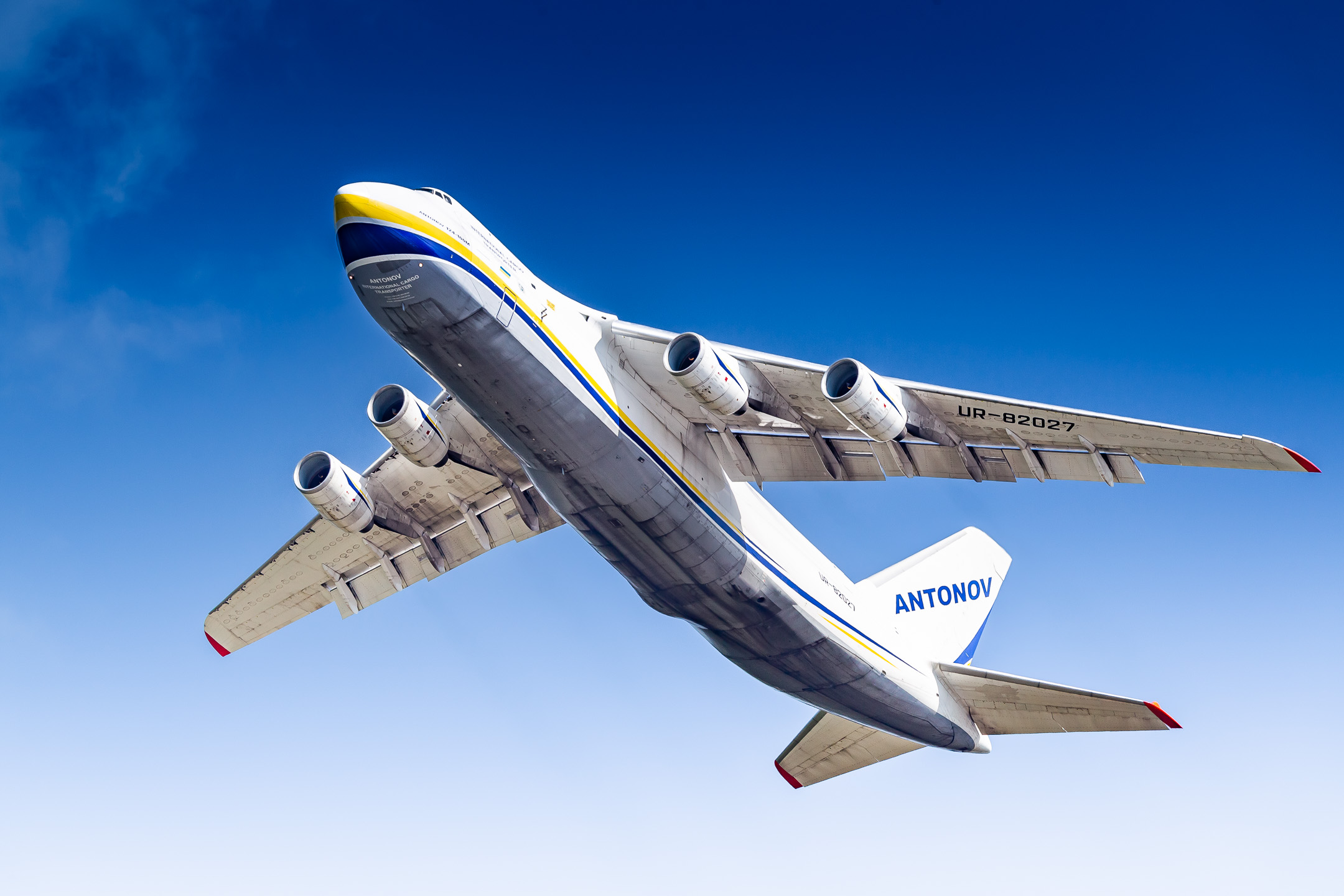 Antonov Airlines An-124 "UR-82027" taking off from runway 32R at Köln Bonn Airport on a hot summer afternoon, May 2022.