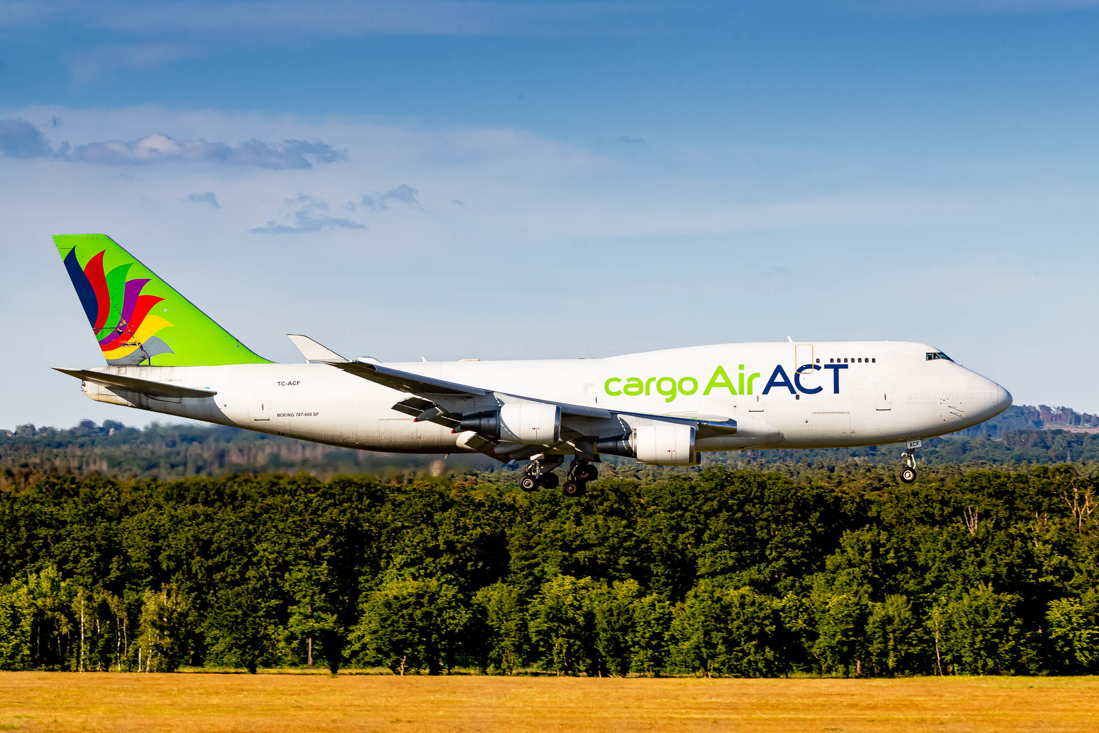 ACT Airlines Boeing 747-400F ("TC-ACF") shortly before touchdown at Köln Bonn Airport on a hot summer evening, June 2022