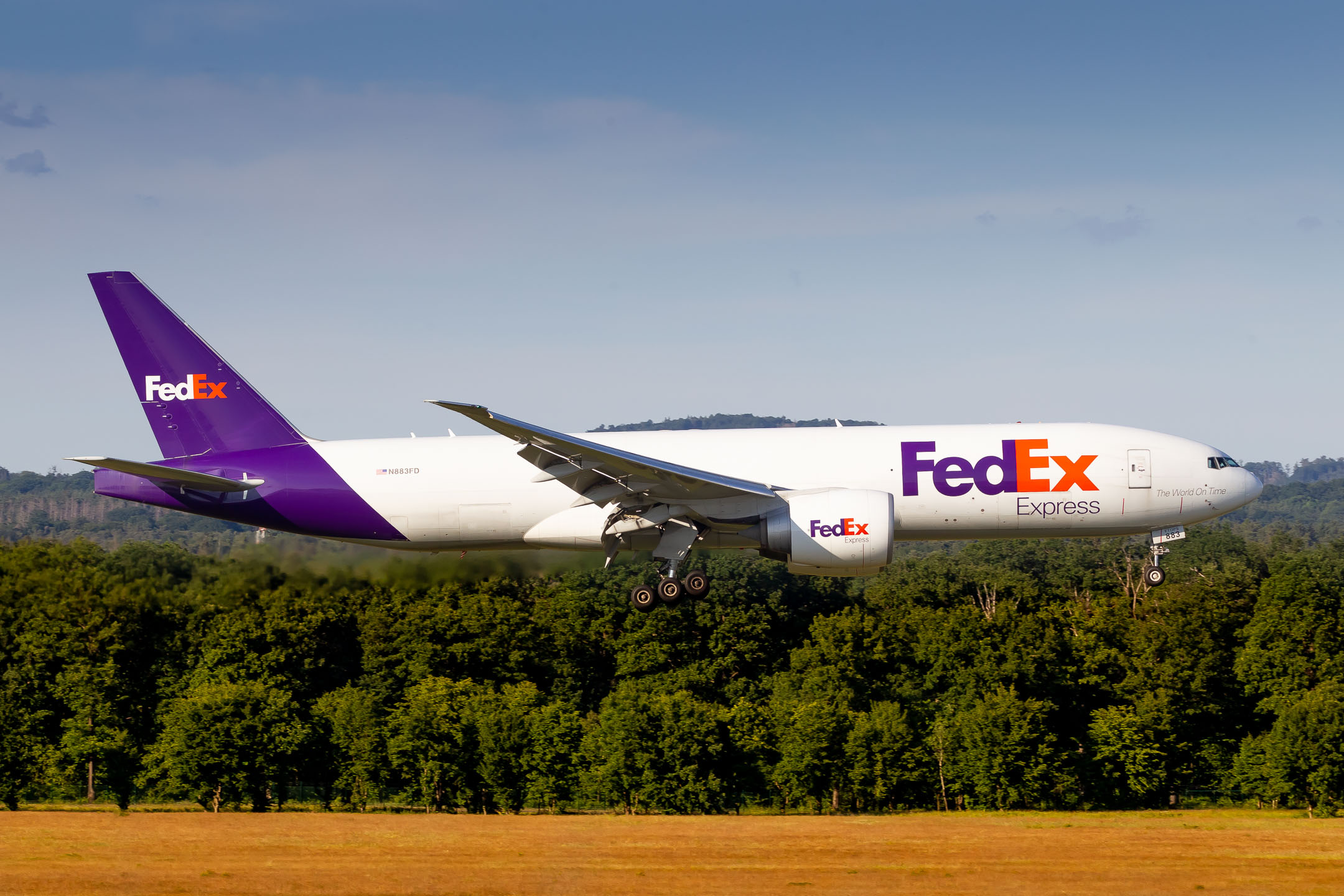 Fedex Boeing 777F "N883FD" on short final for runway 14L at Köln Bonn Airport, June 2022.