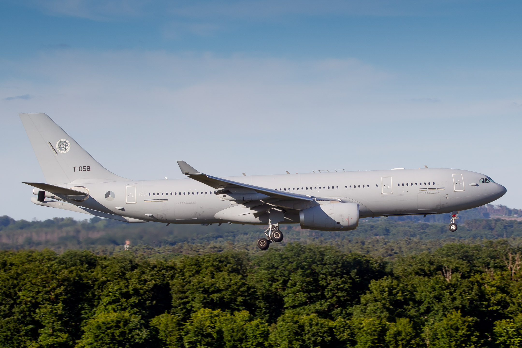 NATO Multinational Multi-Role Tanker Transport Fleet (MMF) Airbus A330-243MRTT "T-058" right before touchdown at runway 14L at Köln Bonn Airport, June 2022.