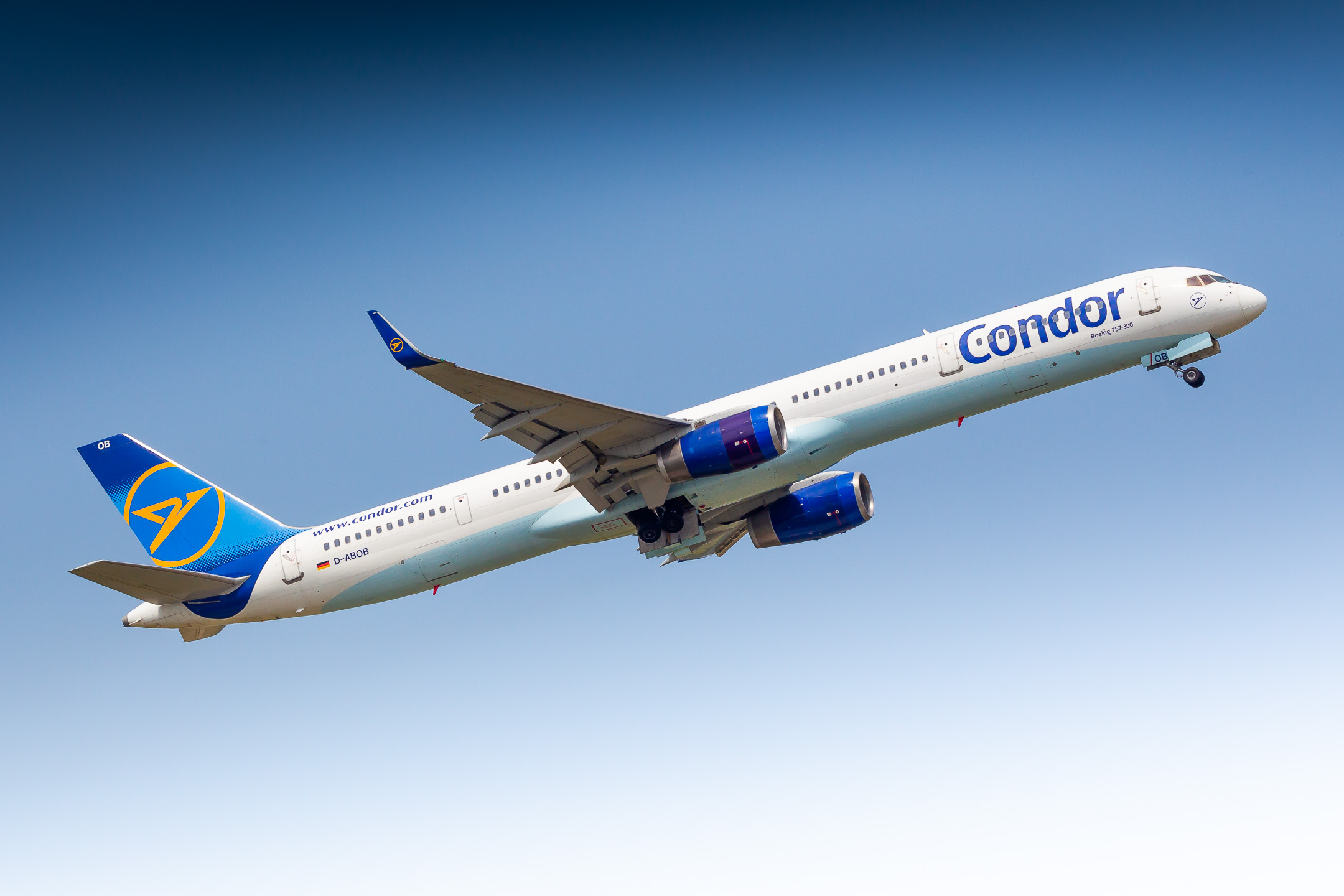 Condor Boeing 757-300 "D-ABOB" taking off from runway 05R at Düsseldorf Airport, June 2022.