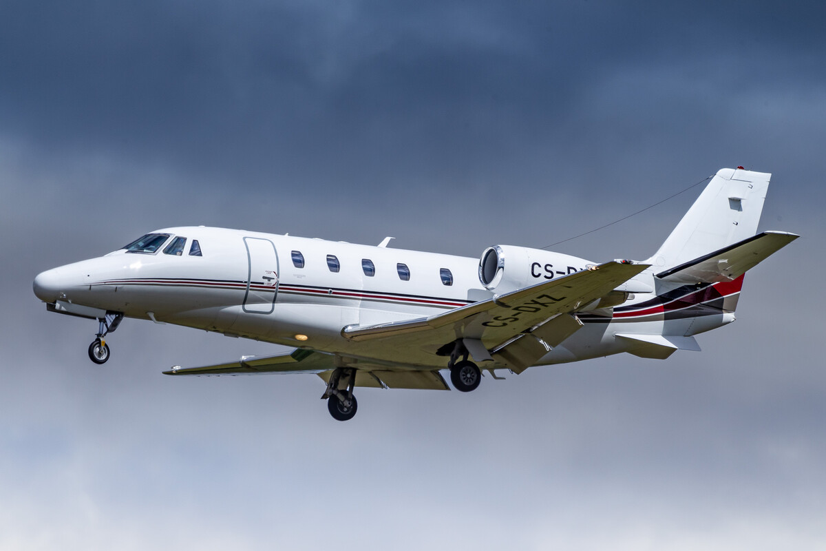 Netjets Europe Cessna 560XL Citation XLS "CS-DXZ" on short final for runway 23 left at Düsseldorf Airport on a warm summer morning, June 2022