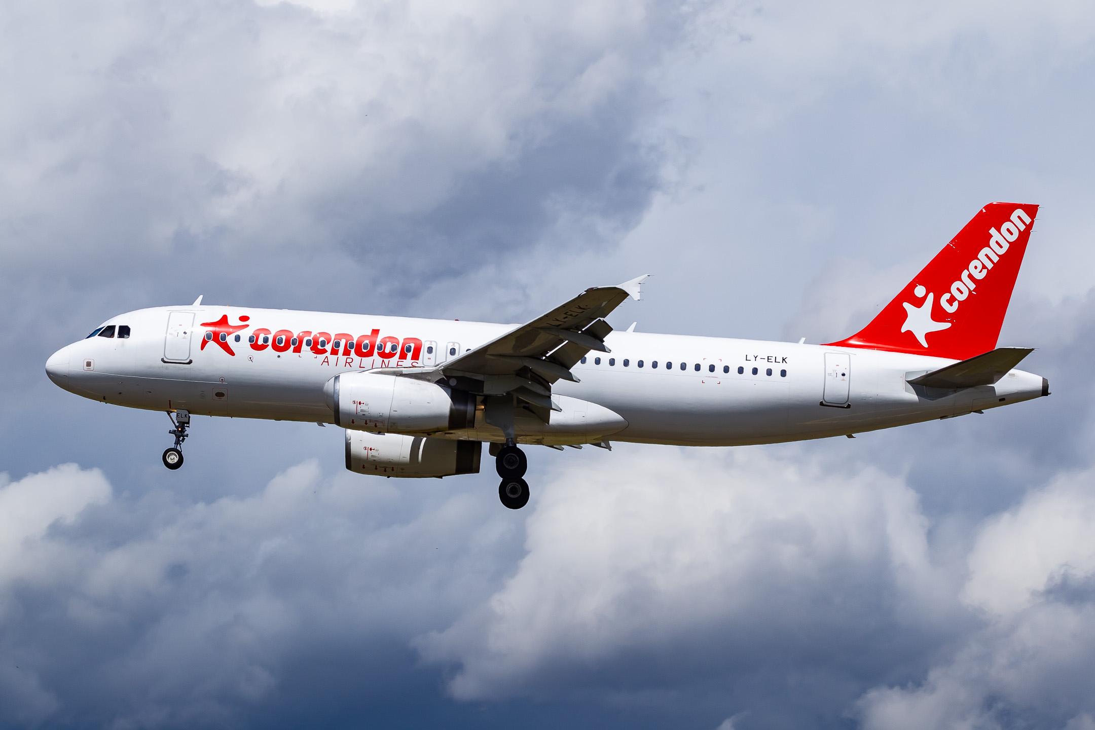 Corendon Airlines Airbus A320-200 "LY-ELK" on short final for runway 23 left at Düsseldorf Airport on a cloudy summer afternoon, June 2022