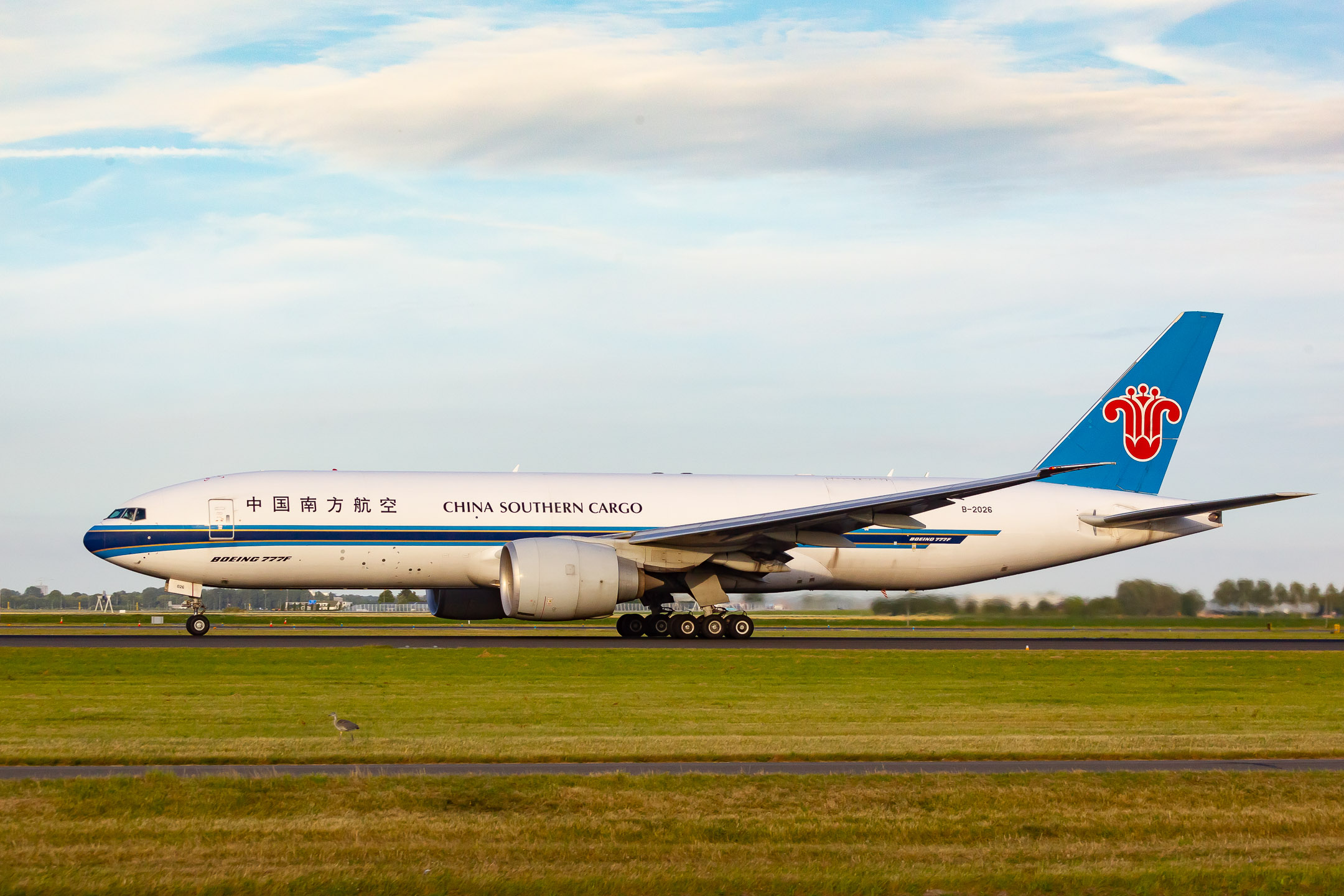 China Southern Cargo Boeing 777-F "B-2026" accelerating on the Polderbaan runway at Amsterdam Schiphol Airport, July 2022.