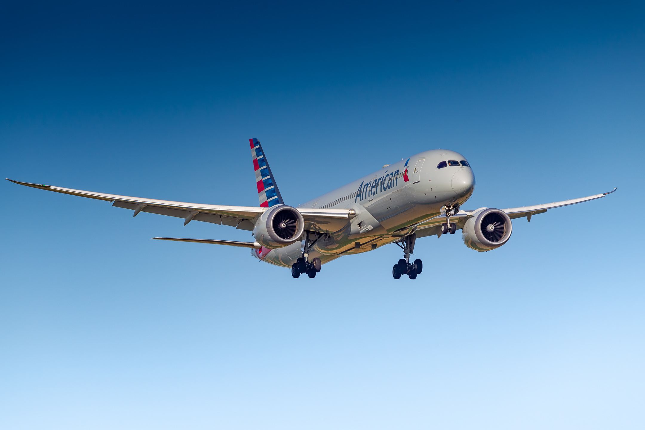 American Airlines Boeing 787-9 Dreamliner "N838AA" coming in on short final for runway 06 at Amsterdam Schiphol Airport on a hot summer day, July 2022