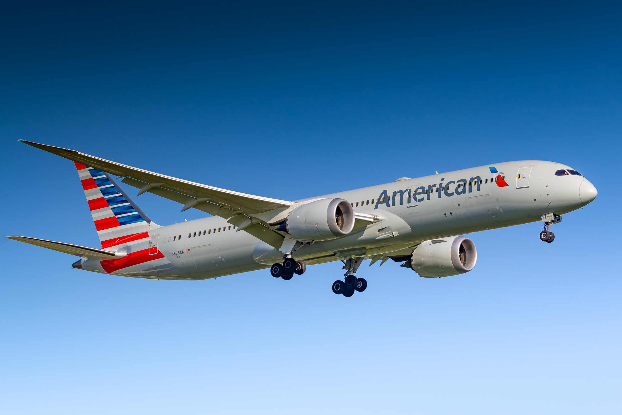 American Airlines Boeing 787-9 Dreamliner "N838AA" coming in on short final for runway 06 at Amsterdam Schiphol Airport on a hot summer day, July 2022.