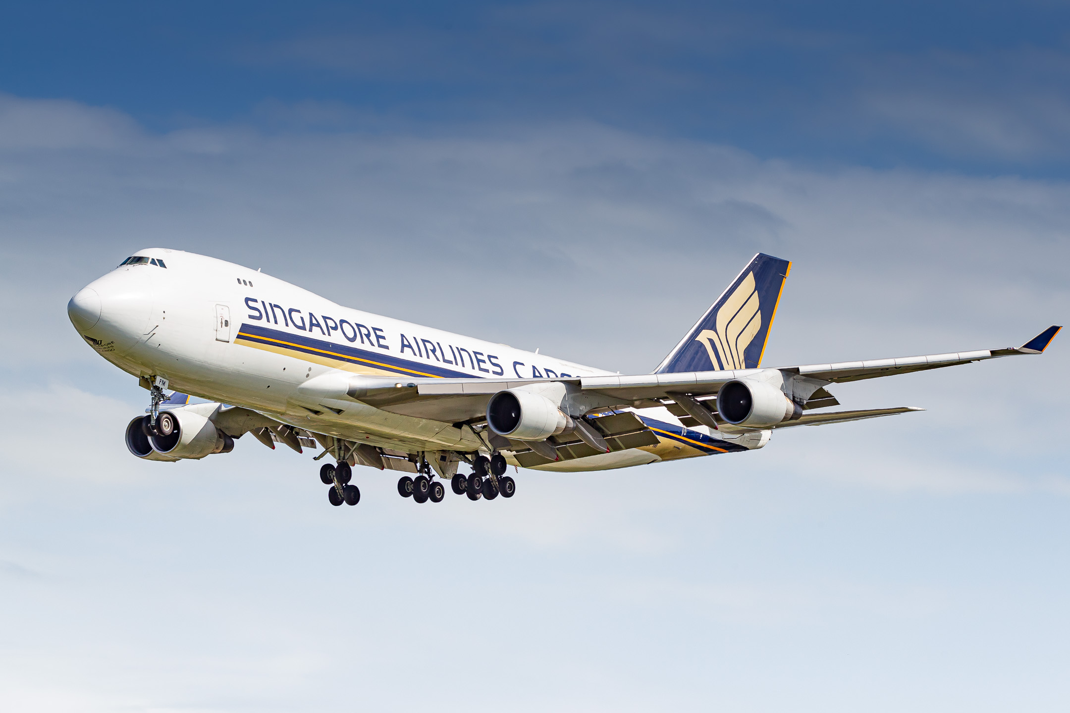 Singapore Airlines Cargo Boeing 747-400F "9V-SFM" coming on on the Polderbaan runway at Amsterdam Schiphol Airport on a hot summer day, July 2022