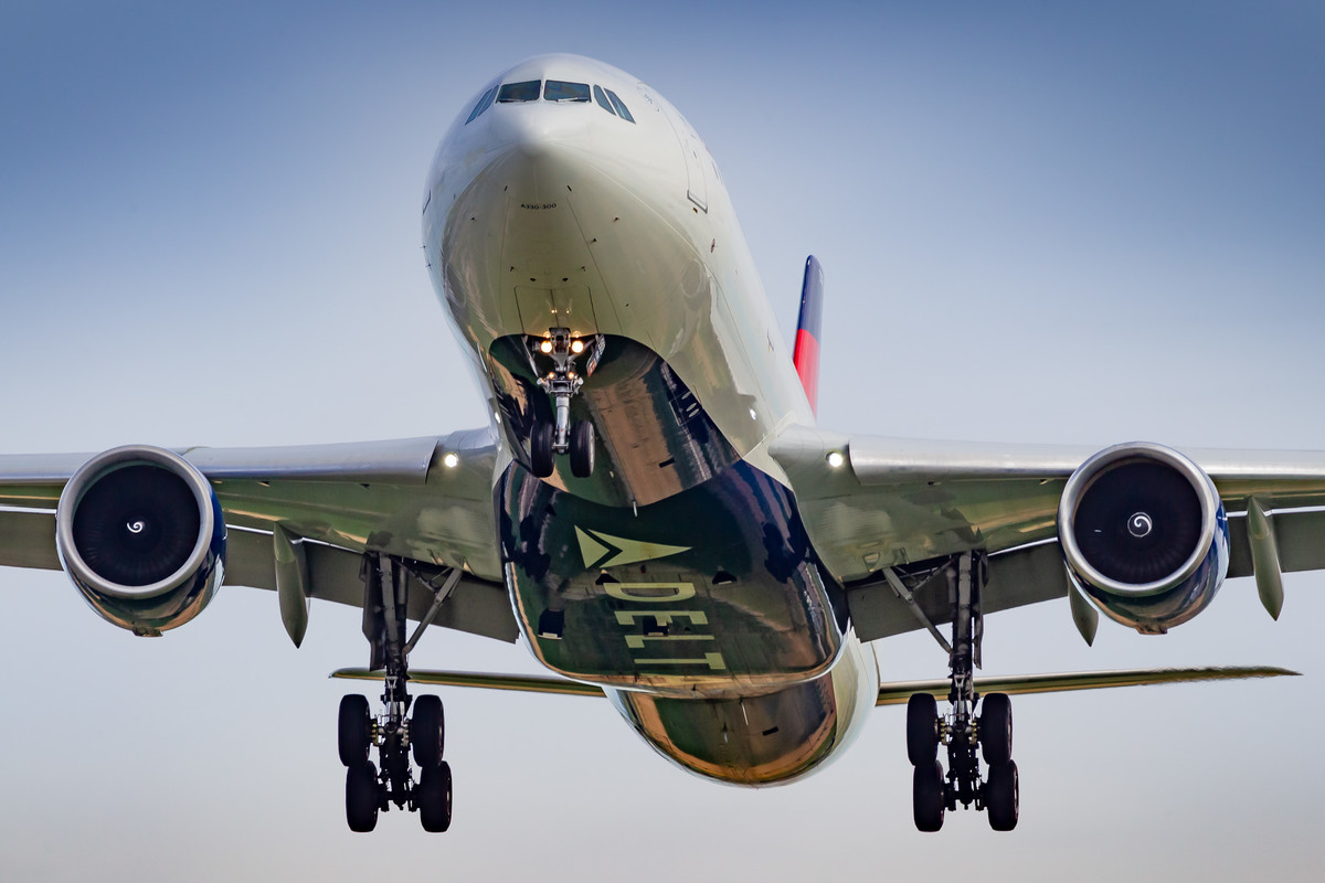 Delta Airbus A330-300 "N803NW" coming in on runway 18 right at Amsterdam Schiphol Airport, called the "Polderbaan" on a warm summer day, July 2022.