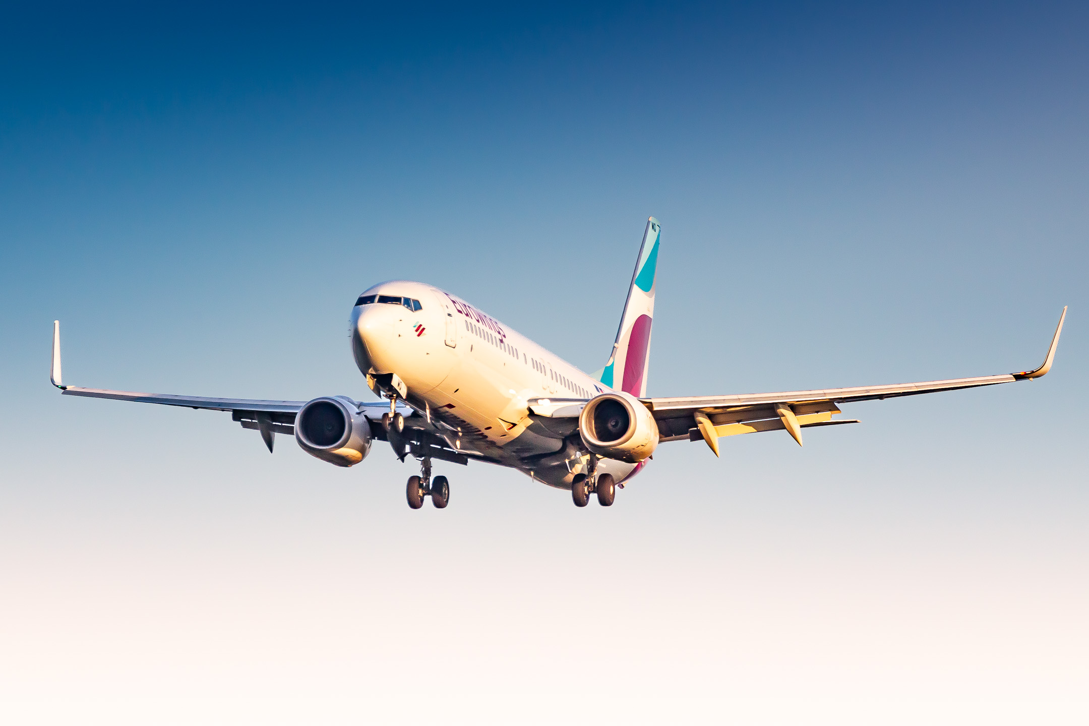 Eurowings Boeing 737-800 "D-ABMQ" coming in over the Wahner Heide on short final for runway 32 right at Köln Bonn Airport on a sunny autumn afternoon, September 2022