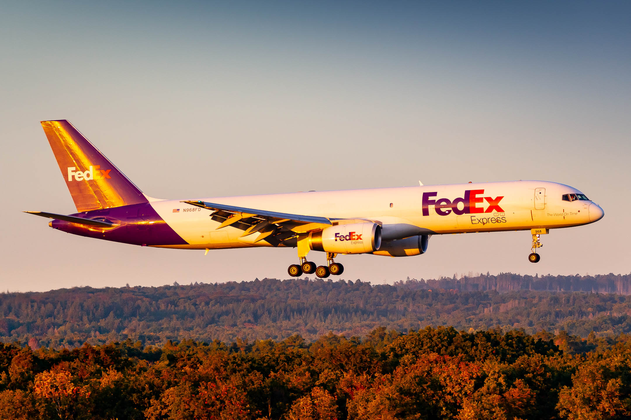 Fedex Boeing 757-200F "N968FD" short before touchdown at runway 14 left at Köln Bonn Airport in the beautiful light of the setting sun on a clear winter afternoon, November 2022