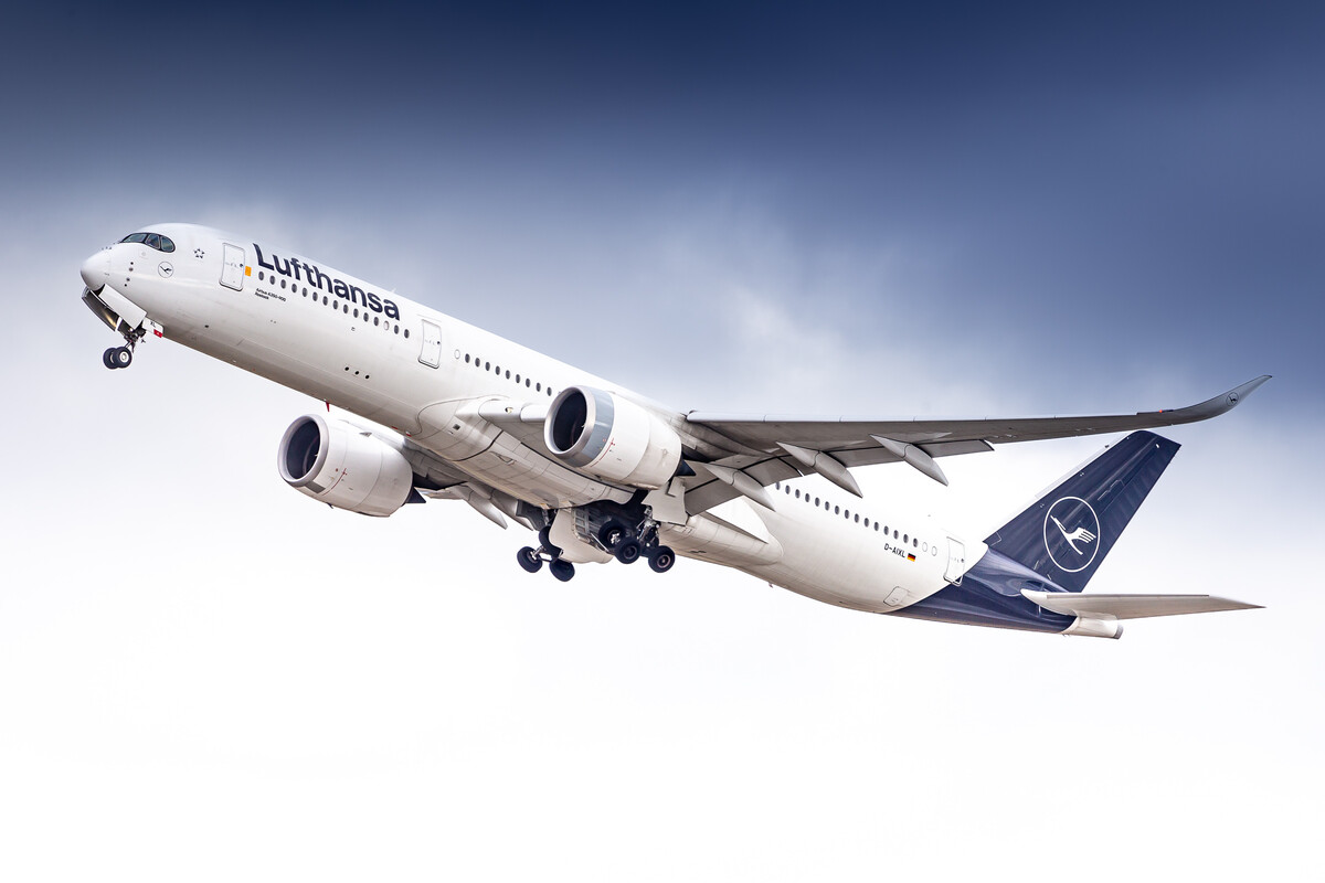 Lufthansa Airbus A350-900 "D-AIXL" taking off from runway 26 right at München Airport on a cloudy winter afternoon, February 2023