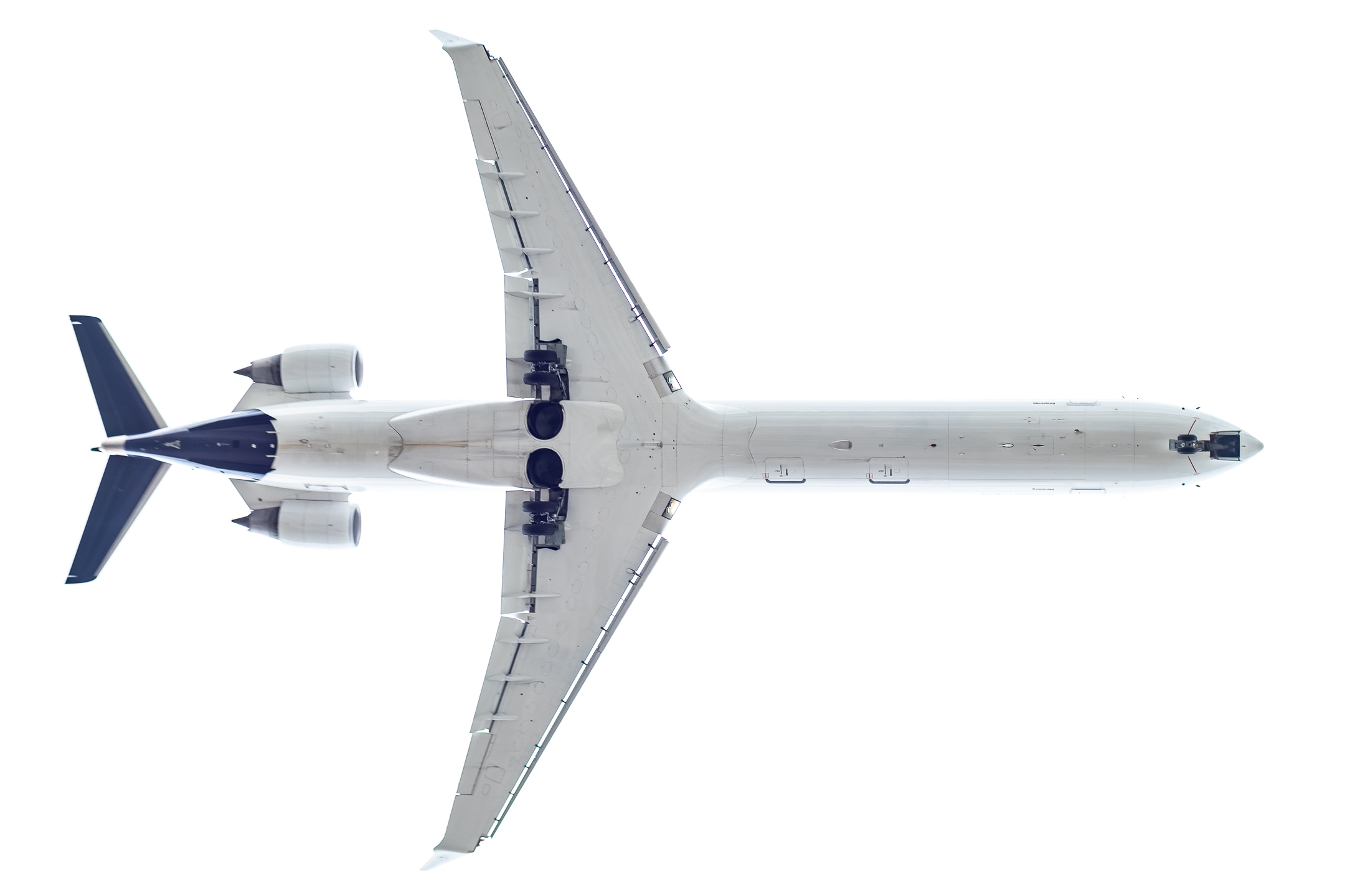 Lufthansa Bombardier CRJ-900 "D-ACNK" named after the city of Merseburg on short final for runway 25 center at Frankfurt airport on a cloudy spring afternoon, April 2023