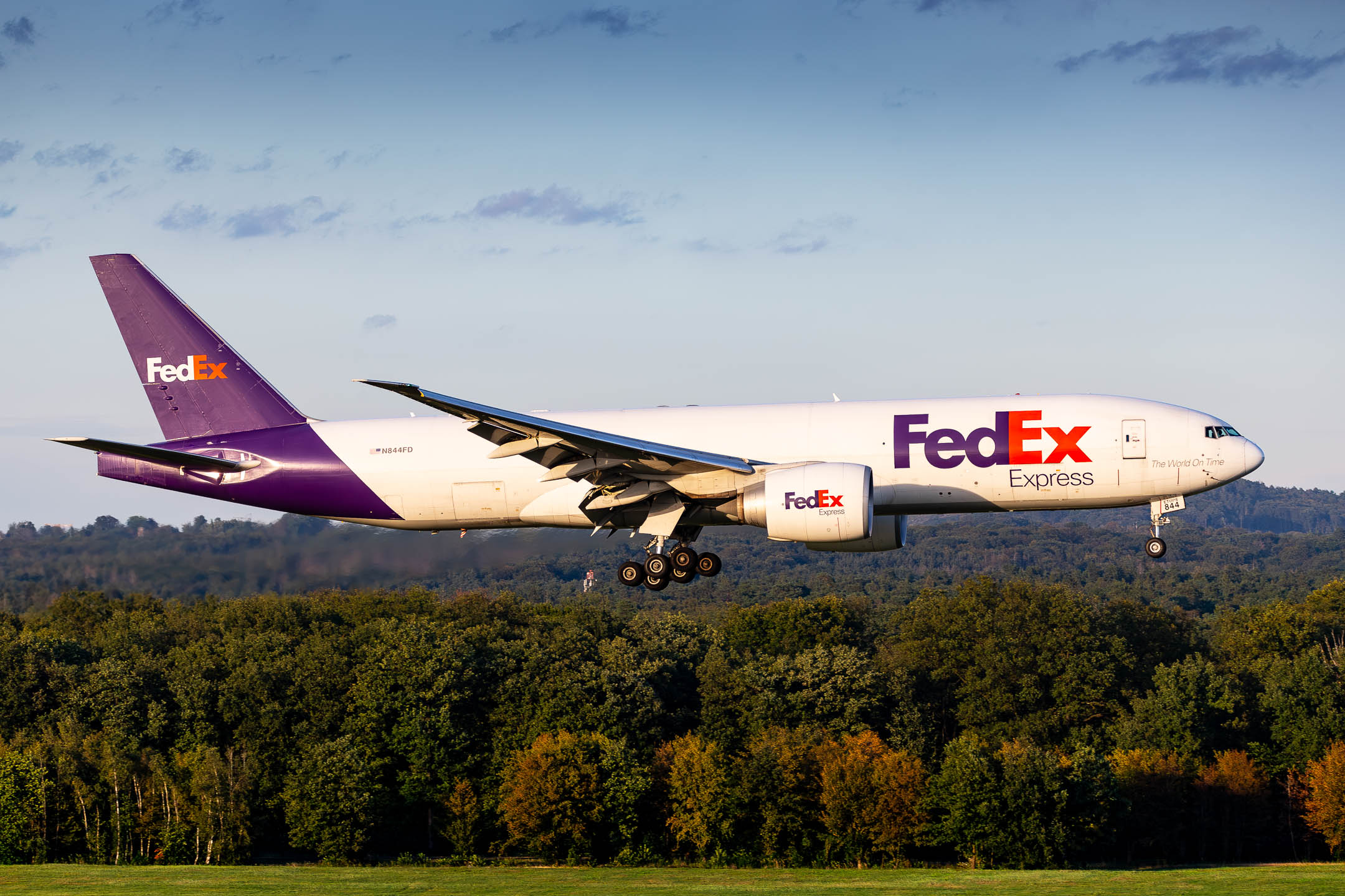 Fedex Boeing 777F "N844FD" right before touchdown at Köln Bonn Airport on a warum late summer evening, September 2023