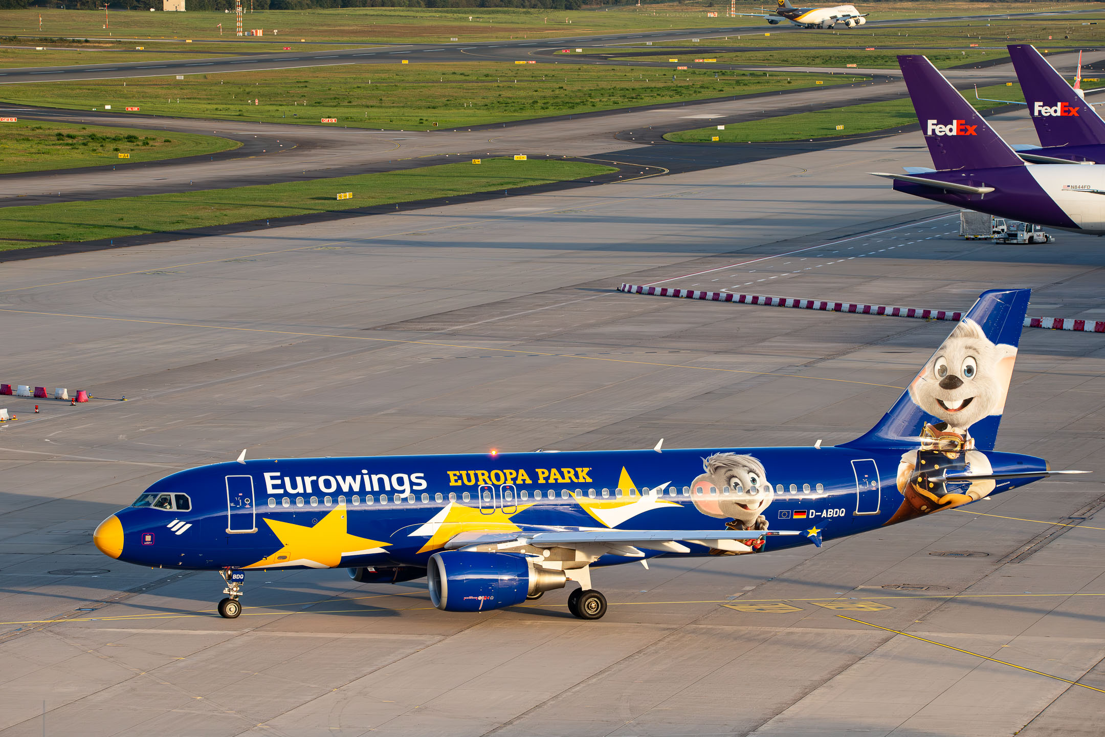 Eurowings Airbus A320-200 "D-ABDQ" with the Europapark livery taxiing on the ground at Köln Bonn Airport, September 2023