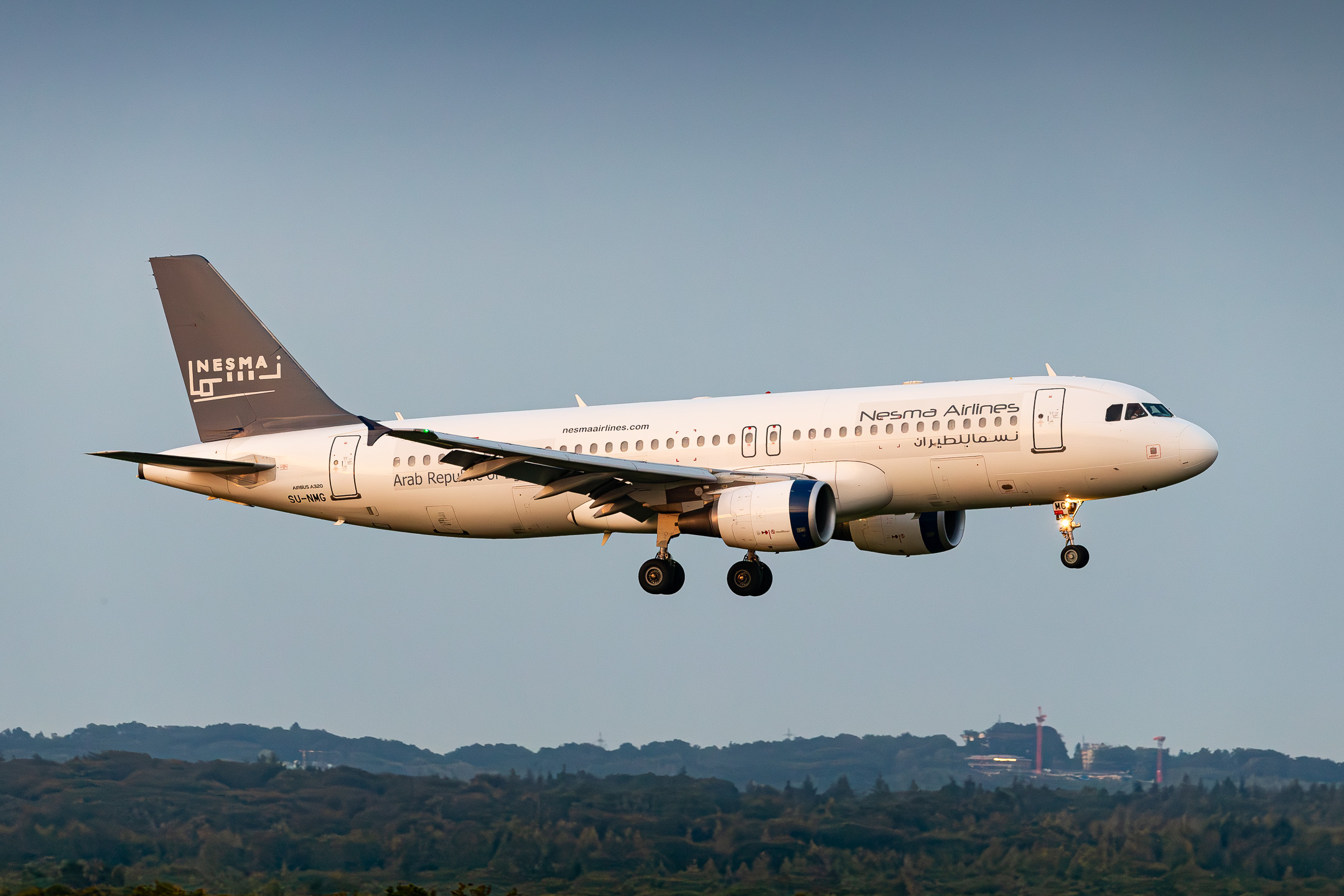 Nesma Airlines Airbus A320-200 "SU-NMG" on short final for runway 14L at Köln Bonn Airport on a late summer evening, September 2023